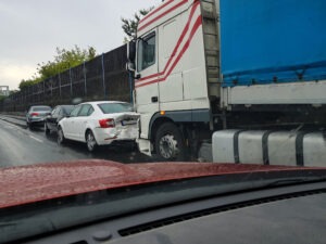 truck-and-car-along-the-road-after-a-rear-end-accident