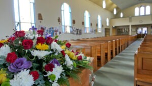 flowers in church at a funeral