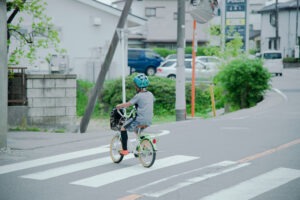 kid-on-a-bike-in-crosswalk