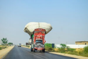 overloaded truck on the highway