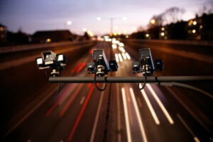 traffic cameras monitoring a busy road