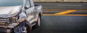 crashed-silver-pickup-truck