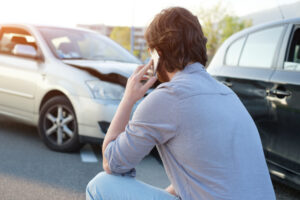 man-calling-for-help-after-multi-car-crash