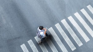 overhead view of man in crosswalk