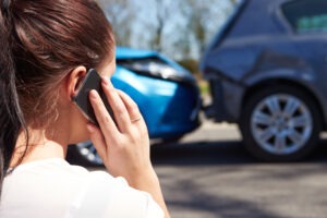 woman-calling-for-help-after-rear-end-crash