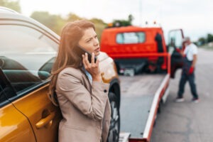 woman calling for help after truck crash