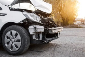 wrecked white car