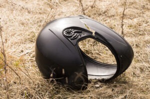 motorcycle-accident-helmet-split-on-ground