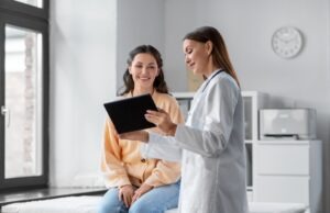 woman talking to doctor