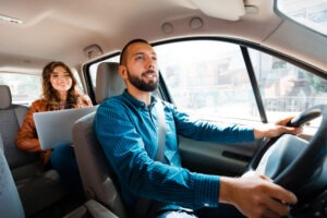 Uber driver conversing with passenger