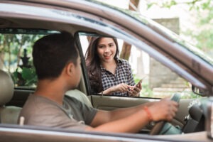 Uber driver picking up passenger