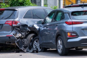 dark cars crashed into each other