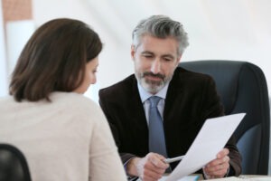 lawyer working with client