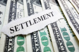 settlement headline on money