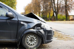 black car with broken hood