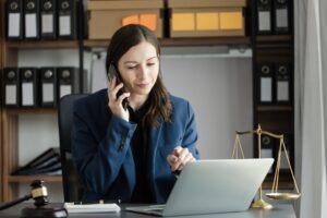 lawyer on the phone at her desk