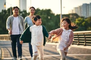 family of asian pedestrians