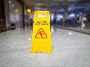 wet floor sign in office lobby